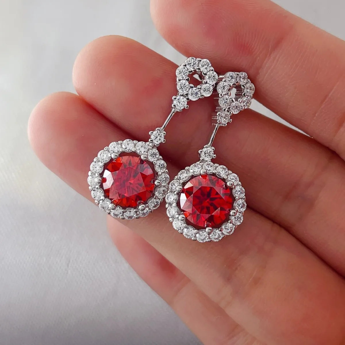 4 Carat Ruby Red Crystal Drop Earrings with Rhinestone Halo by Sparkala