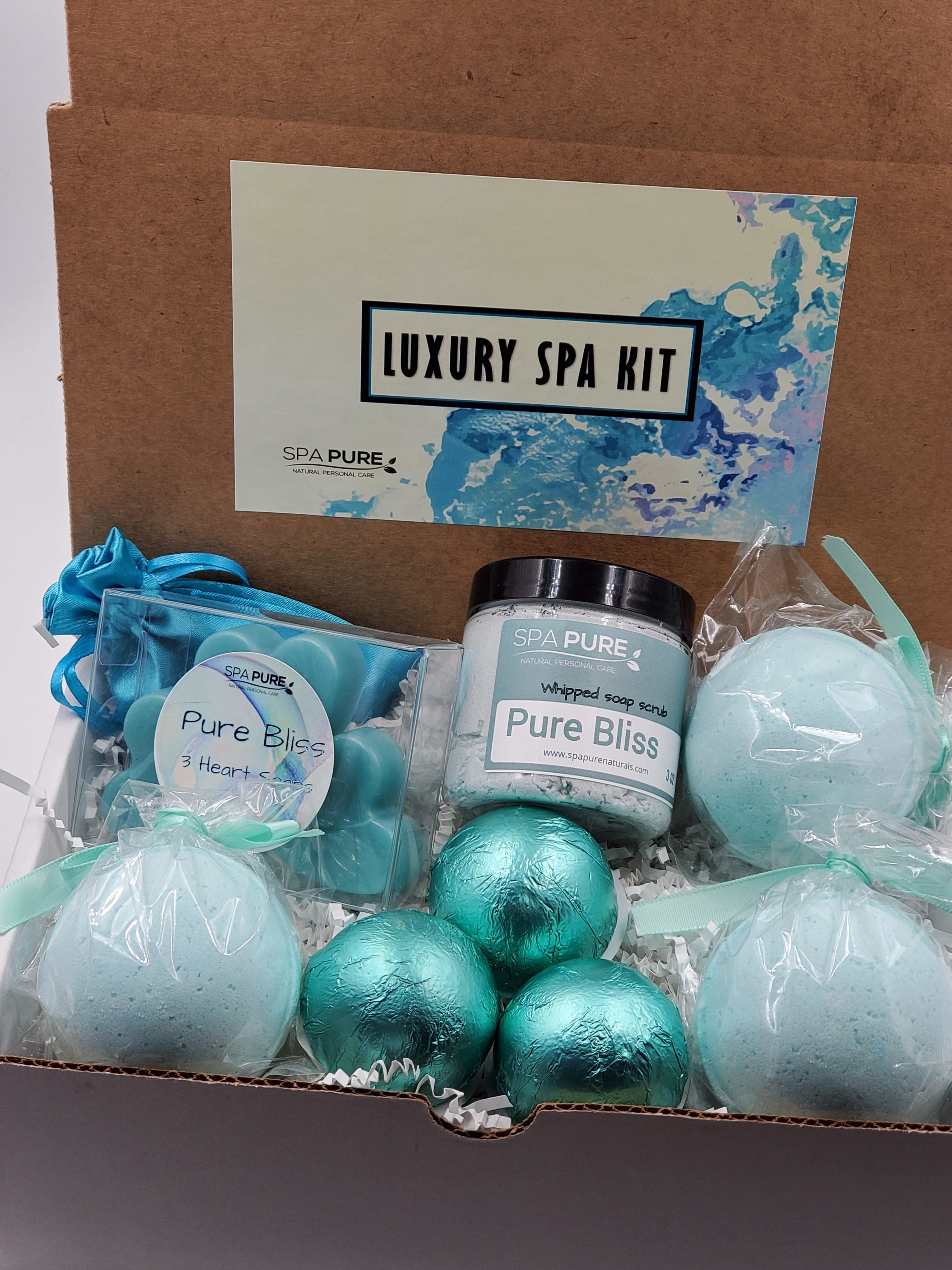 Spa Pure Luxury Spa Kit - Pure Bliss - 3 XL Pure Bliss Bath Fizzies, 3 Pure Bliss shower steamers, 3 Heart-shaped soaps, one 3.5 oz Pure Bliss whipped soap scrub, 1 Roll-on Perfume, Perfect for a mini-spa treatment. by Spa Pure