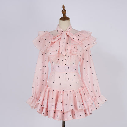 Women Heart Shaped Print Tie Up Ruffled Hem Blouse With High Waisted Short Half Length Skirt Two Piece Sets by Ragazza