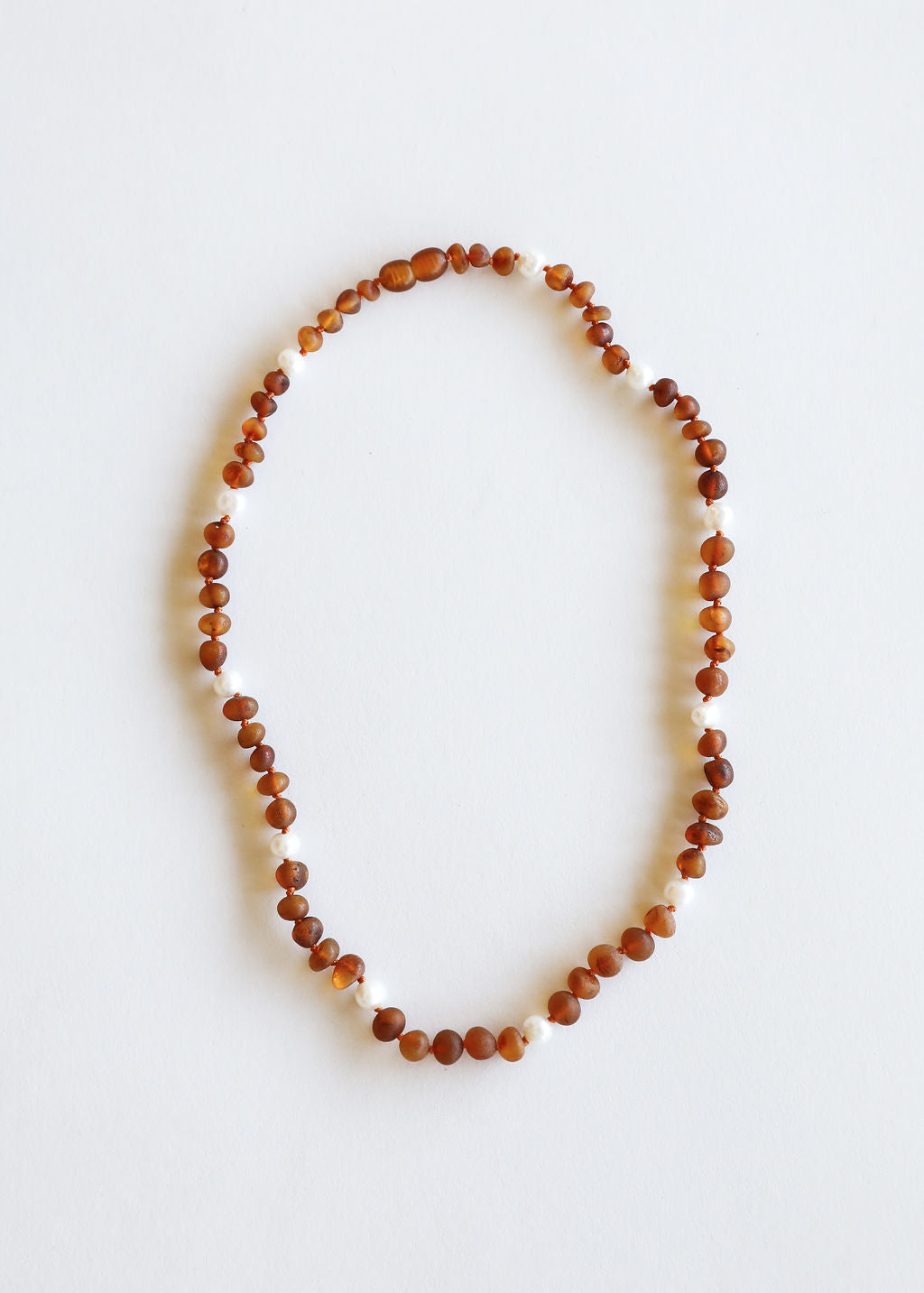 Raw Cognac Baltic Amber + Pearl Halo || Necklace by CanyonLeaf