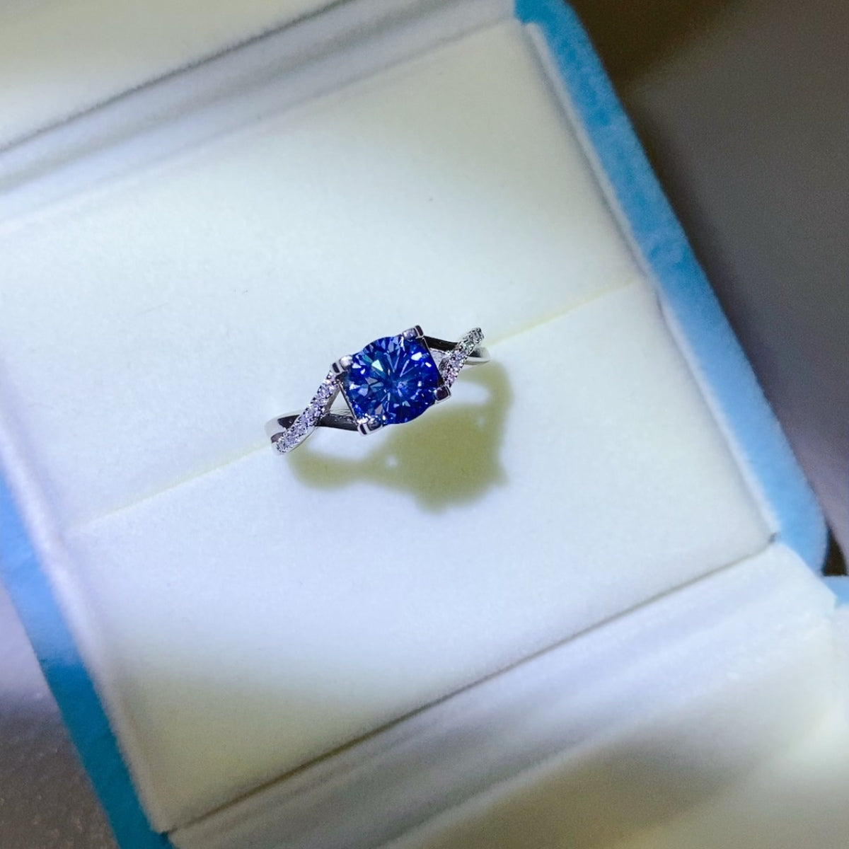 1 Carat Blue Brilliant Round Cut Sparkala™ Crisscross Pure Sterling Silver Ring by Sparkala