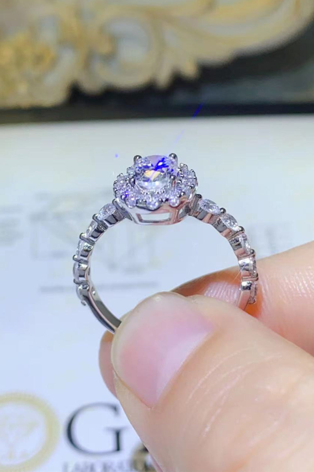 Adored 1 Carat Oval-Cut Sparkala™ Platinum Over Pure Sterling Silver Halo Ring by Sparkala
