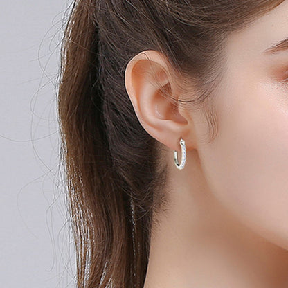Pure Sterling Silver Sparkala™ Huggie Earrings by Sparkala