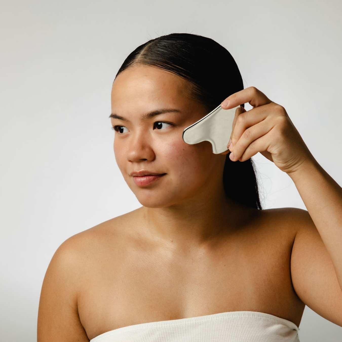 Gua Sha Facial Massage Stone by UpCircle