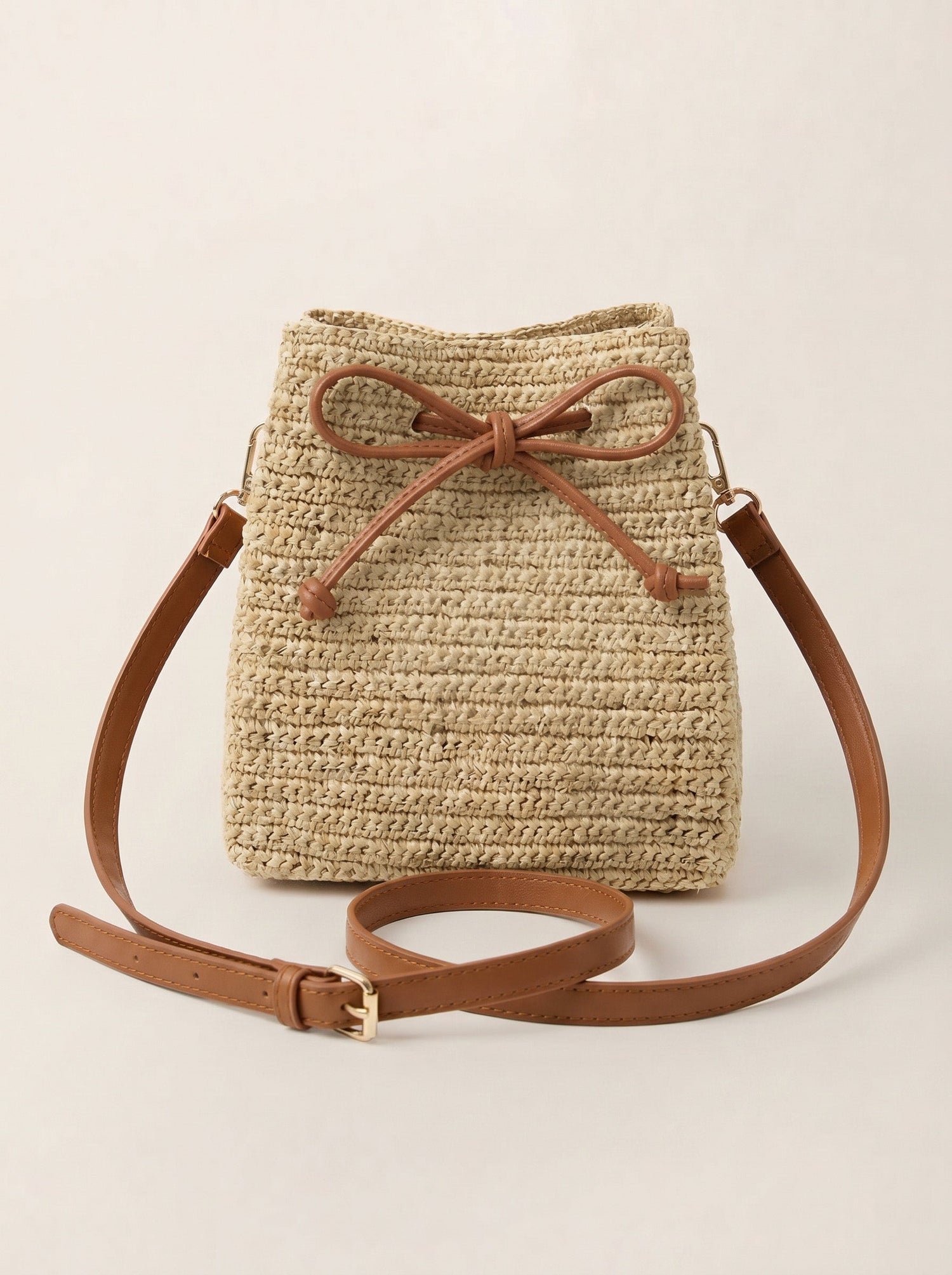 Mini Handwoven Raffia Drawstring Crossbody Bag by LINTICO