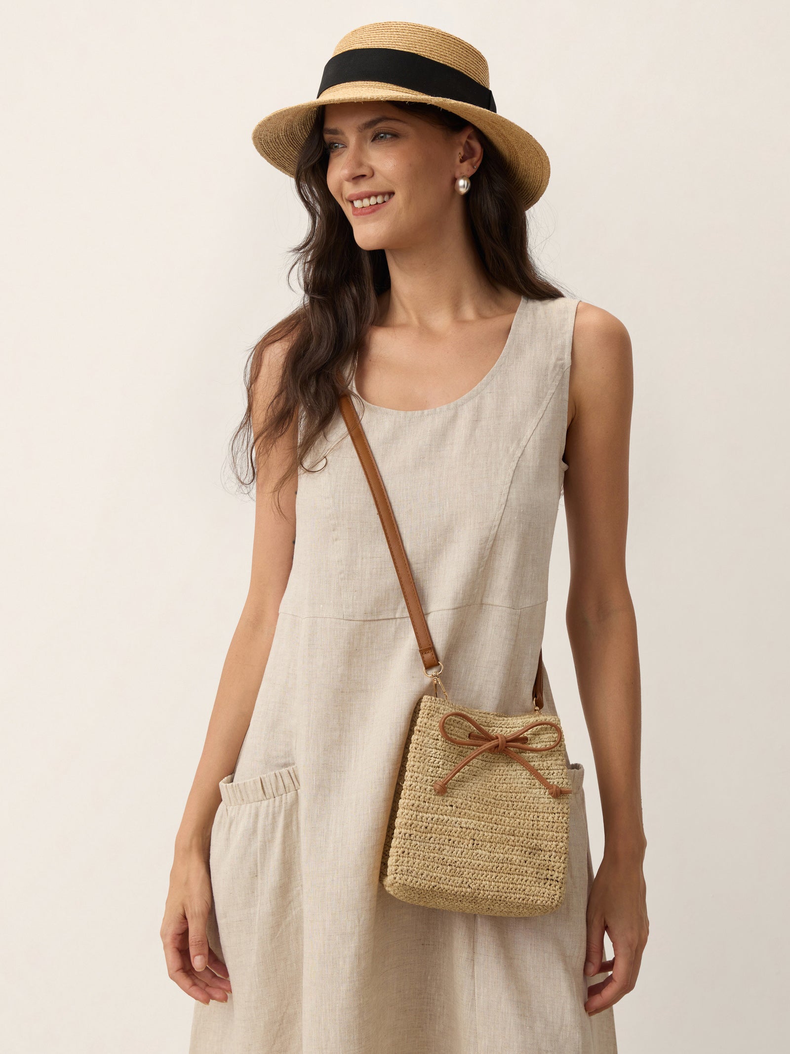 Mini Handwoven Raffia Drawstring Crossbody Bag by LINTICO