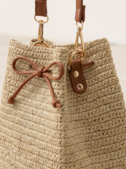 Mini Handwoven Raffia Drawstring Crossbody Bag by LINTICO