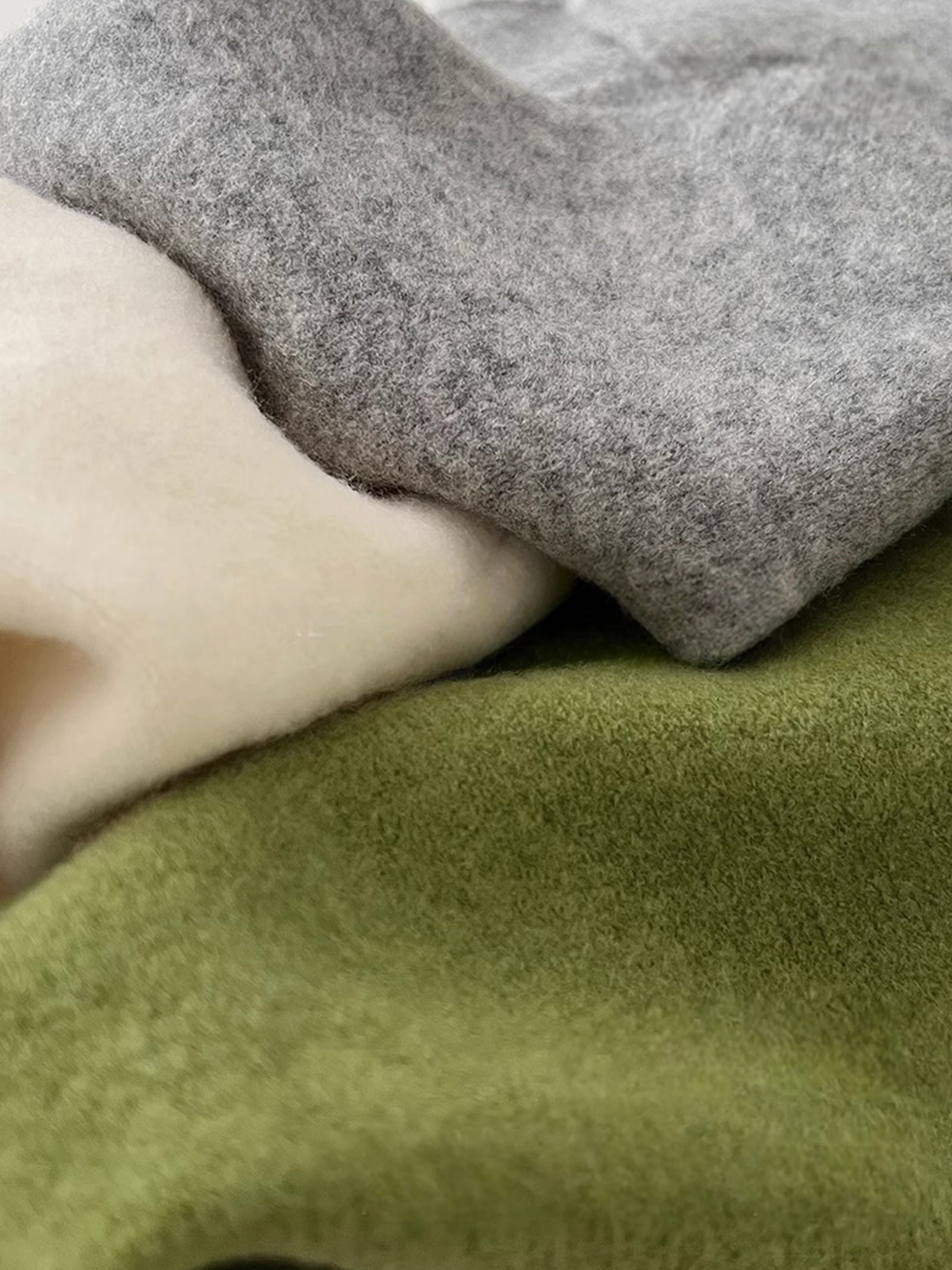 100% Merino Wool Knitted Triangle Scarf by LINTICO