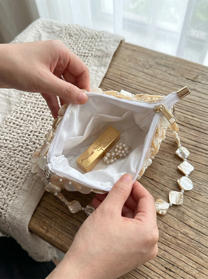 Luxe Handcrafted Mother of Pearl Disc Clutch for Special Occassion &amp; Summer Vacations by LINTICO