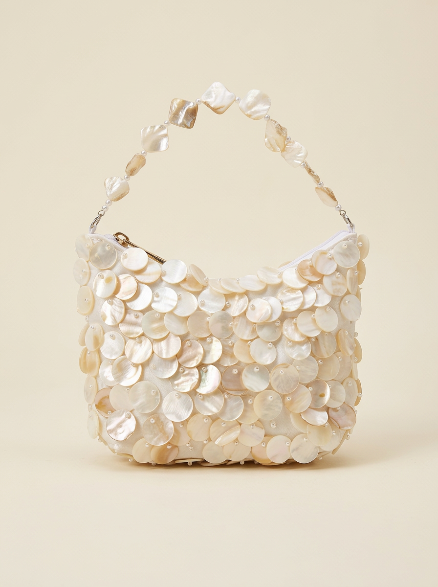 Luxe Handcrafted Mother of Pearl Disc Clutch for Special Occassion &amp; Summer Vacations by LINTICO