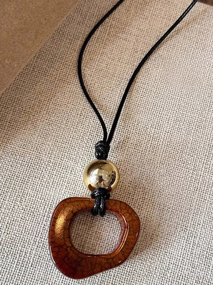 Long Sweater Necklace With Resin Camel Bone Pendant by LINTICO