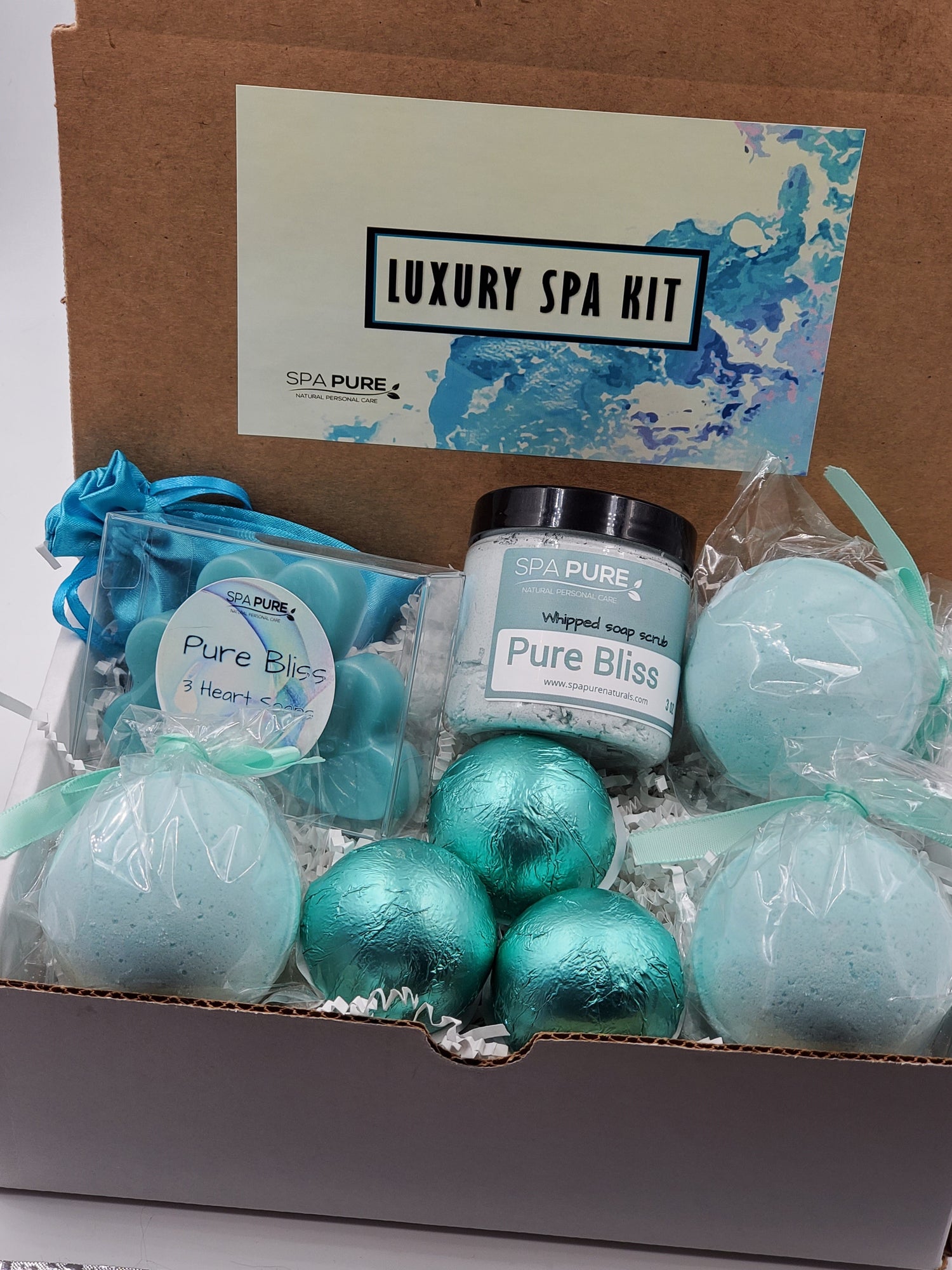 Spa Pure Luxury Spa Kit - Pure Bliss - 3 XL Pure Bliss Bath Fizzies, 3 Pure Bliss shower steamers, 3 Heart-shaped soaps, one 3.5 oz Pure Bliss whipped soap scrub, 1 Roll-on Perfume, Perfect for a mini-spa treatment. by Spa Pure