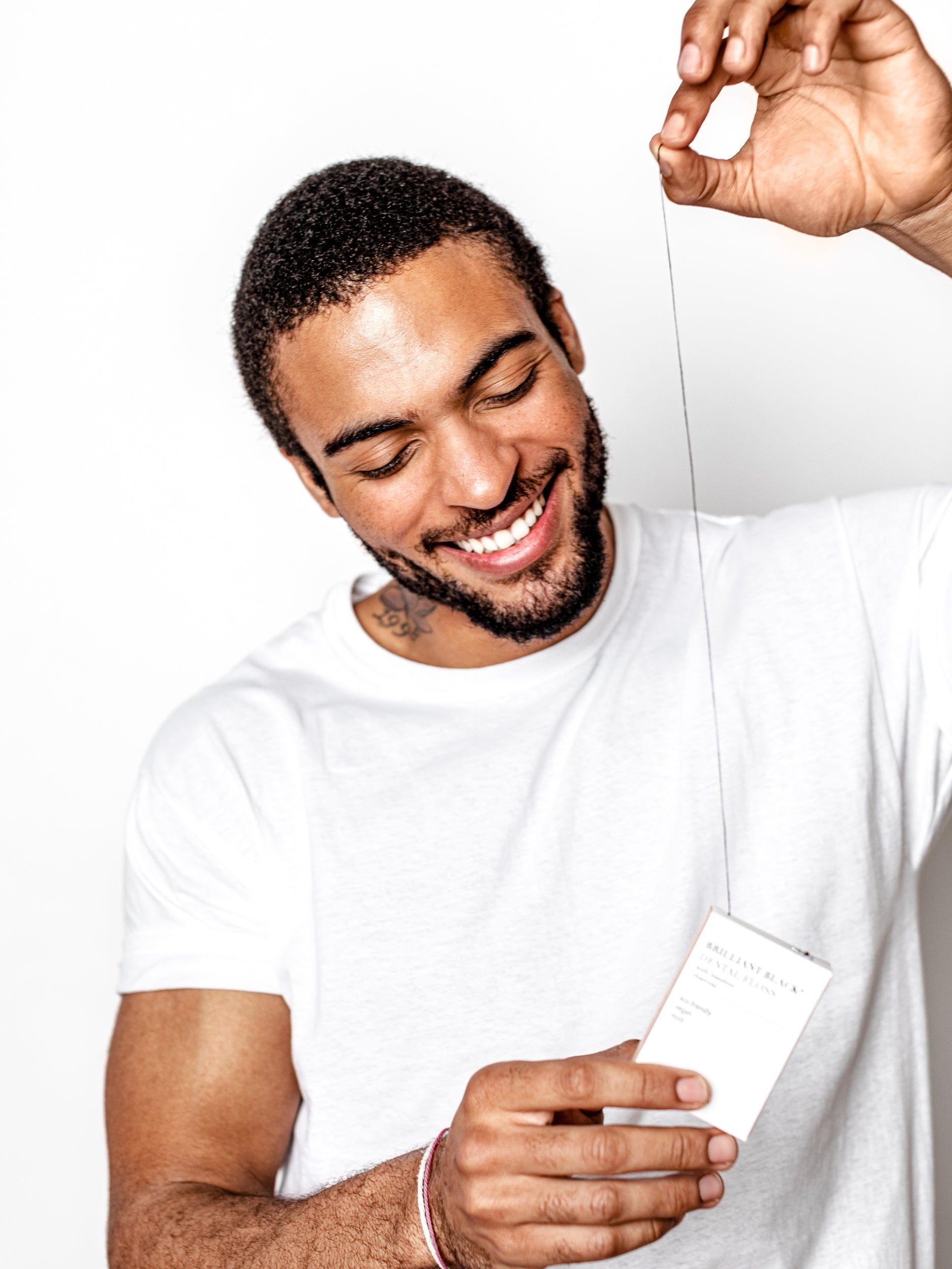Brilliant Black® Floss – Whitens Between Teeth Naturally by Terra &amp; Co.