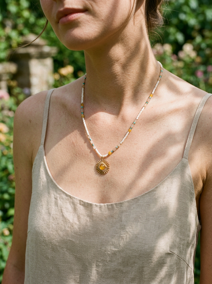 Natural Stone Beaded Necklace with Sun Pendant by LINTICO