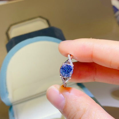 1 Carat Blue Brilliant Round Cut Sparkala™ Crisscross Pure Sterling Silver Ring by Sparkala