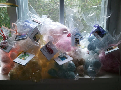 14 bath bombs (select from over 100 fragrances) our Little Bag of Balls (great for dry skin) by Spa Pure