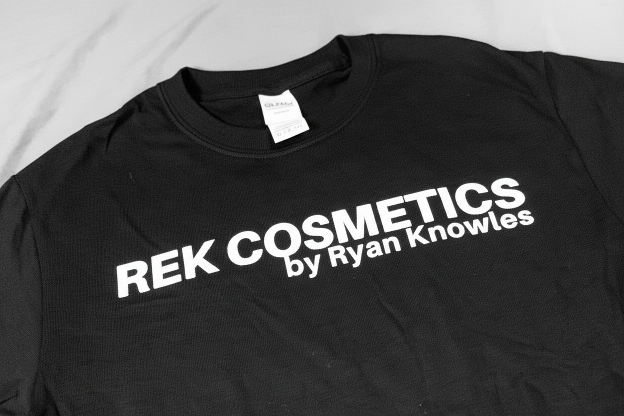 REK Cosmetics by Ryan Knowles T-Shirt Unisex | REK Cosmetics by REK Cosmetics